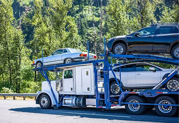 Secure open carrier vehicle transport for long-distance shipping.
